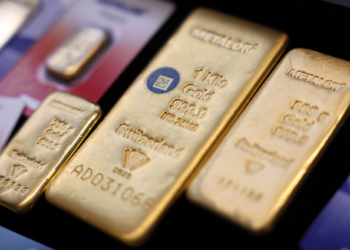 Gold eases as robust US payrolls boost rate-hike bets; inflation data in focus