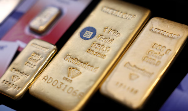 Gold eases as robust US payrolls boost rate-hike bets; inflation data in focus